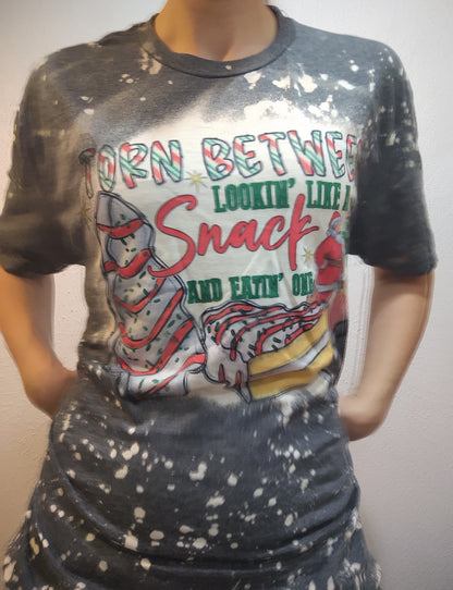 RTS Torn Between Lookin' Like a Snack and Eatin One Funny Bleached Christmas T-Shirt with Santa and Christmas Tree Cakes